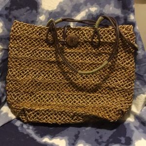 Straw bag with button closure